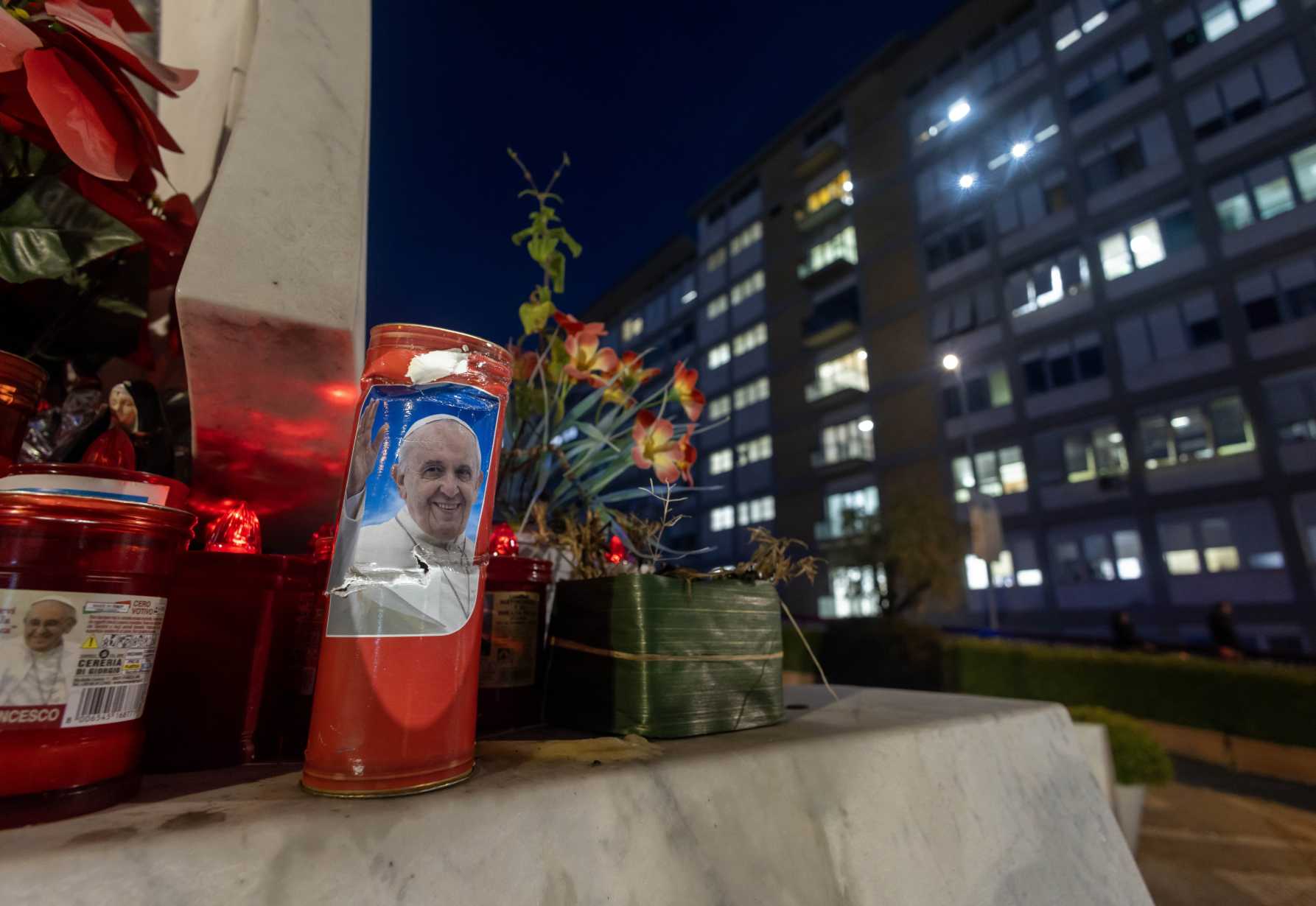 Hospitalized with respiratory infection, pope improving, Vatican says