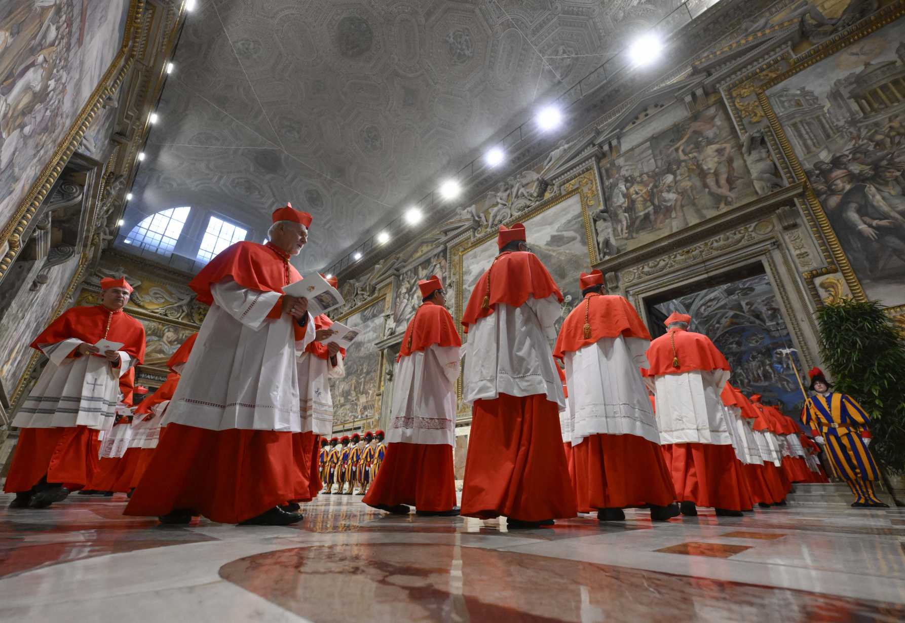 Calling on the Holy Spirit and all the saints, cardinals begin conclave