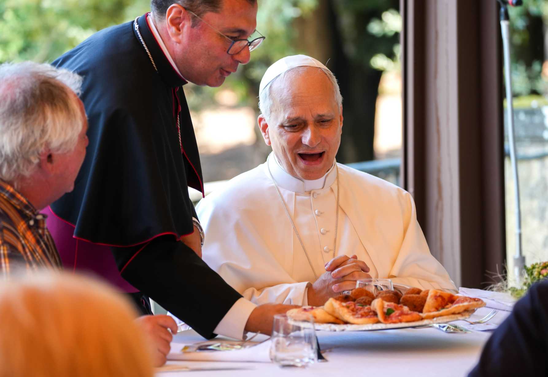 Burn with 'fire' of God's love, pope says at Mass and lunch with the poor
