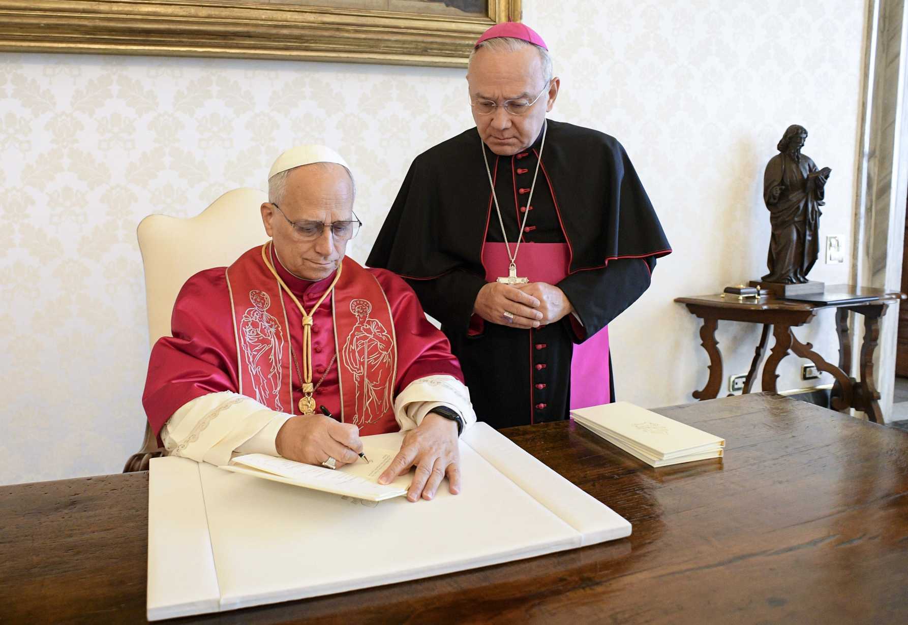 One can't serve God and money, pope says on day he signs text on poverty