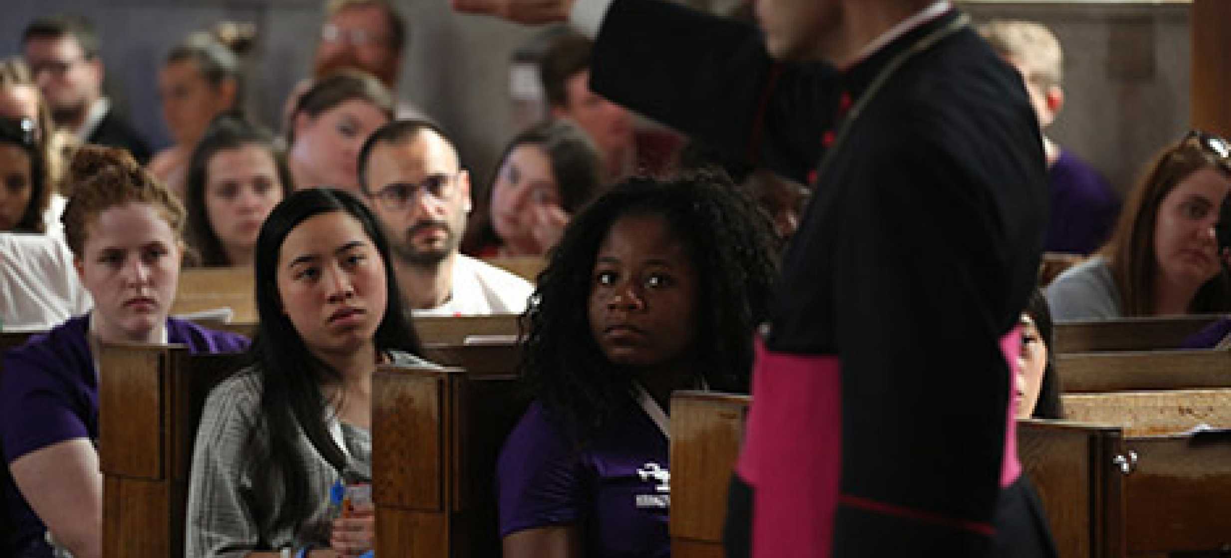 Bishop Frank J. Caggiano of Bridgeport, Conn., speaks to World Youth Day pilgrims at Sacred  Heart Church in Krakow, Poland, July 28. (CNS photo/Bob Roller)