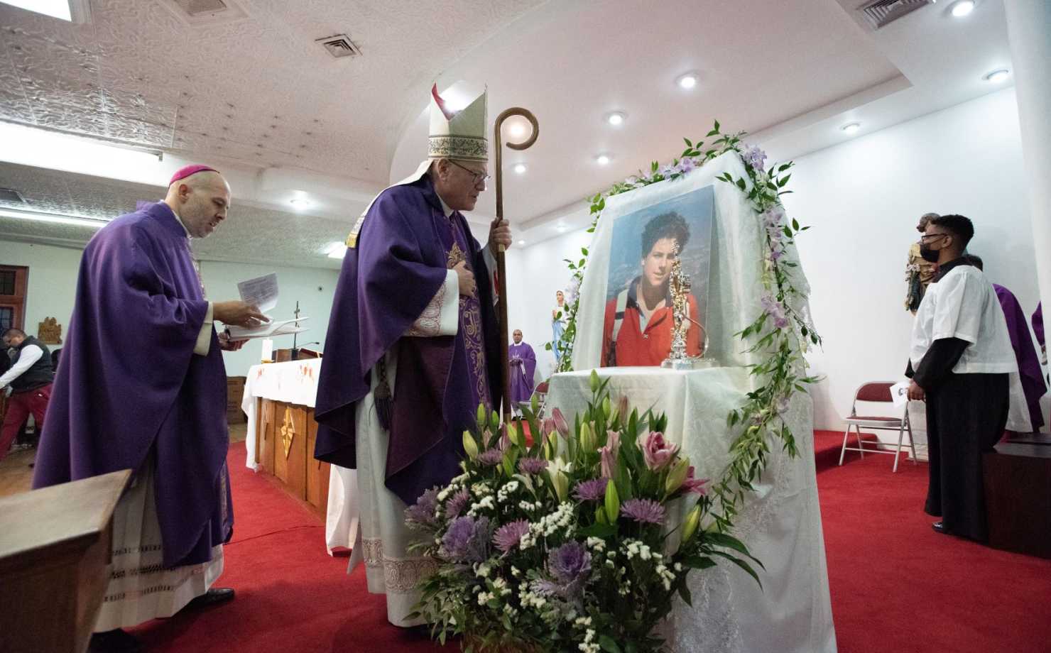 Cardinal Timothy Dolan venerates the relic of Blessed Carlo Actuis