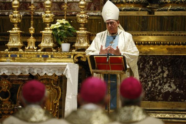 Archbishop Joseph F. Naumann preaching at Mass