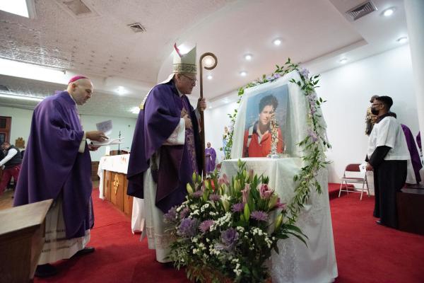 Cardinal Timothy Dolan venerates the relic of Blessed Carlo Actuis