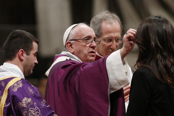 Pope Francis distributes ashes