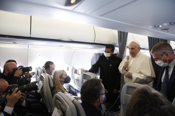 pope on plane from Greece