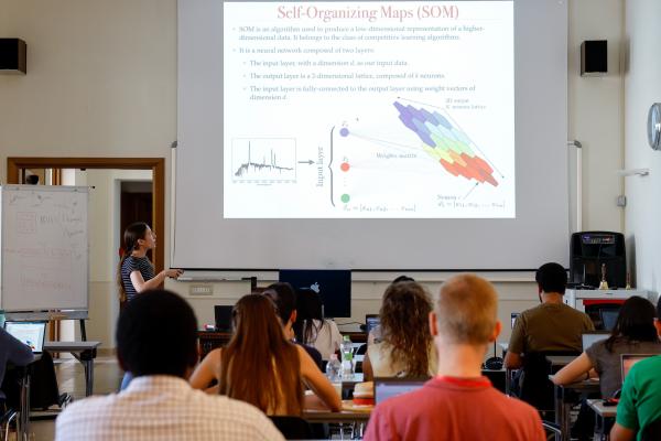 Students attend a lecture on data interpretation.