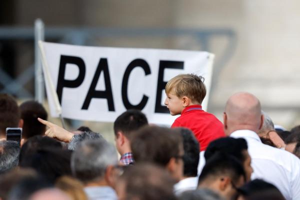Peace sign in St. Peter's Square