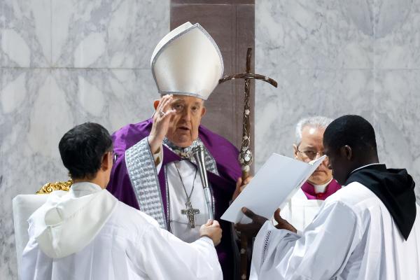 Pope Francis gives his blessing.