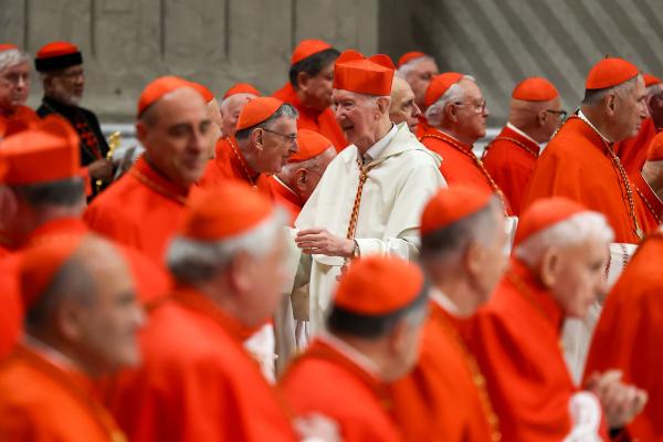 Cardinal Radcliffe is congratulated by other cardinals