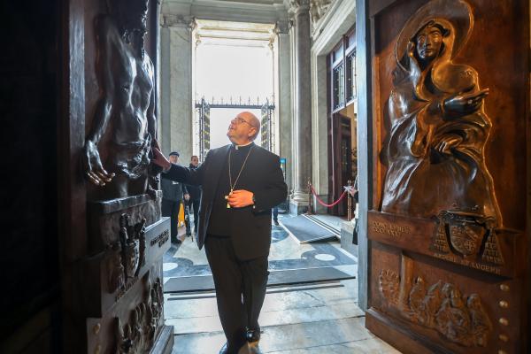Bishop Malesic goes through Holy Door at St. Mary Major