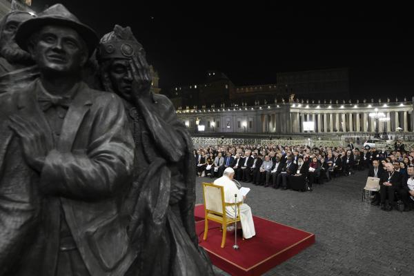 Pope Francis prays for migrants and refugees