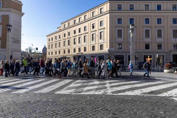 Pilgrims in Rome process along Via della Conciliazione, the boulevard that leads to St. Peter's Square.