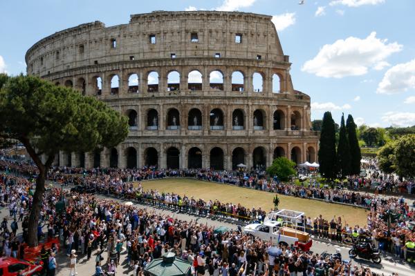 Pope Francis' casket is driven past the Colosseum
