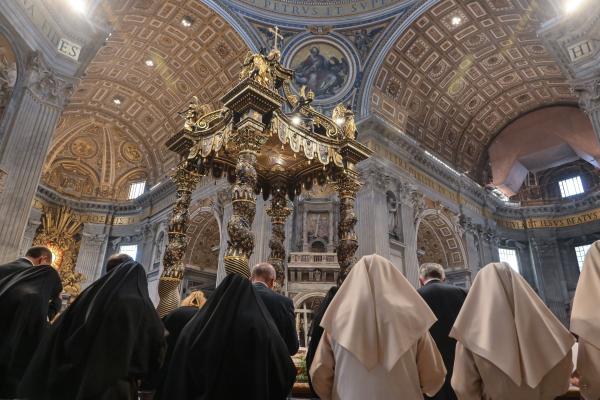 Religious sisters participate in Mass in St. Peter's Basilica.