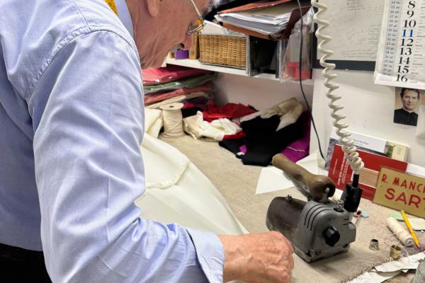 Raniero Mancinelli irons a possible cassock for the new pope