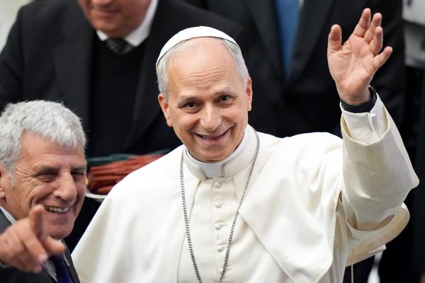 Pope Leo XIV waves to photographers