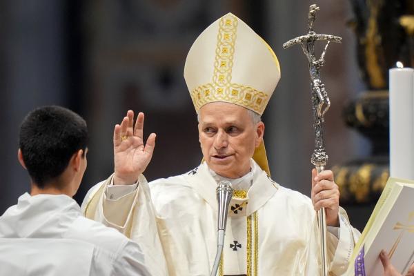 Pope Leo XIV gives his blessing at the end of Mass.