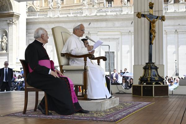 Pope Leo XIV addresses visitors in St. Peter's Square.
