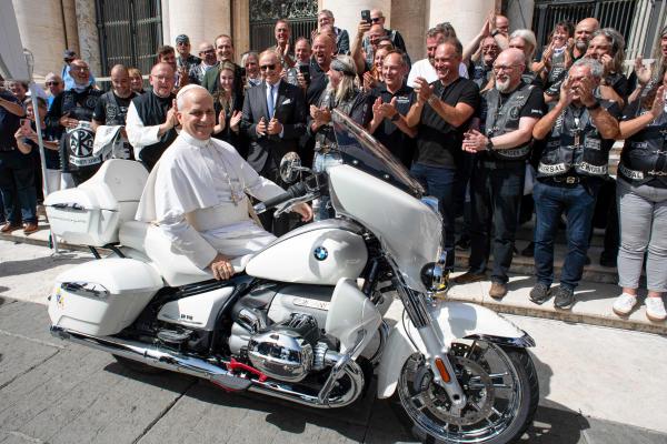 Pope Leo XIV sits on the BMW R18 motorcycle