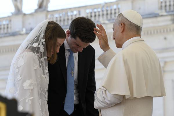 Pope Leo blesses a newlywed couple