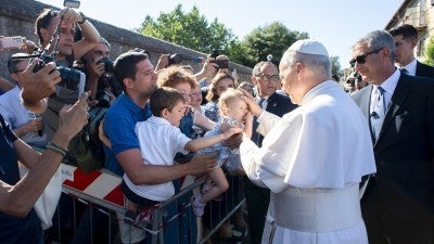 After 12 years, locals welcome pope back to his summer home