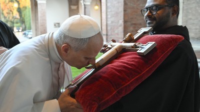 Churches should be joyful places of sharing gift of faith, pope says