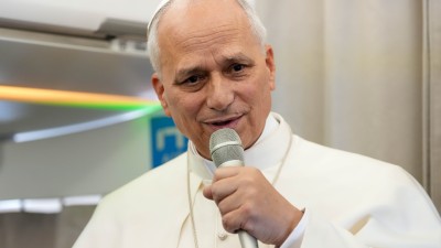 Pope tells reporters dialogue is always the answer to tense situations