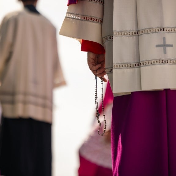 Bishop with rosary