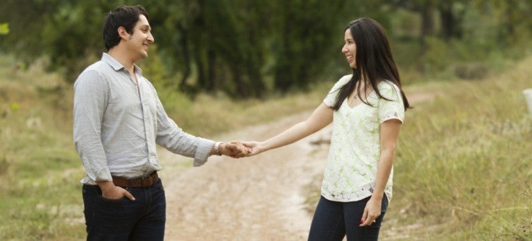 Couple walking in the woods