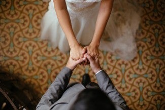 A bride and groom dancing 