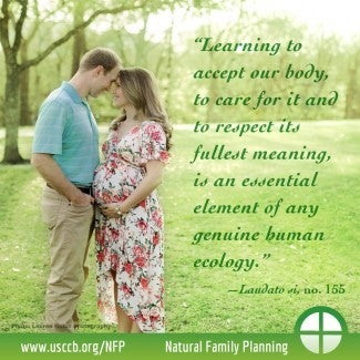 Pregnant wife holds belly and leans into husband