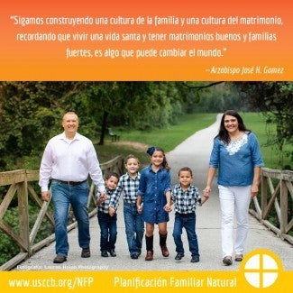 Family with four small children walking together