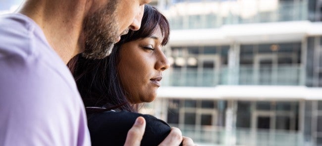 Man comforting a woman