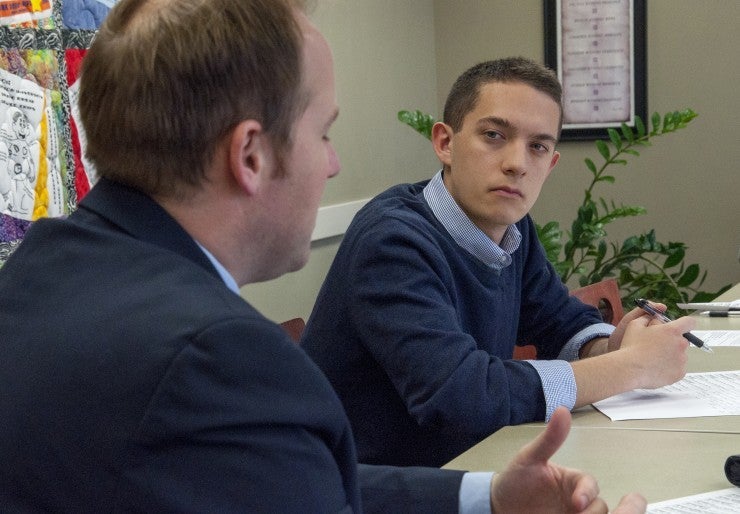Two people sitting at a table