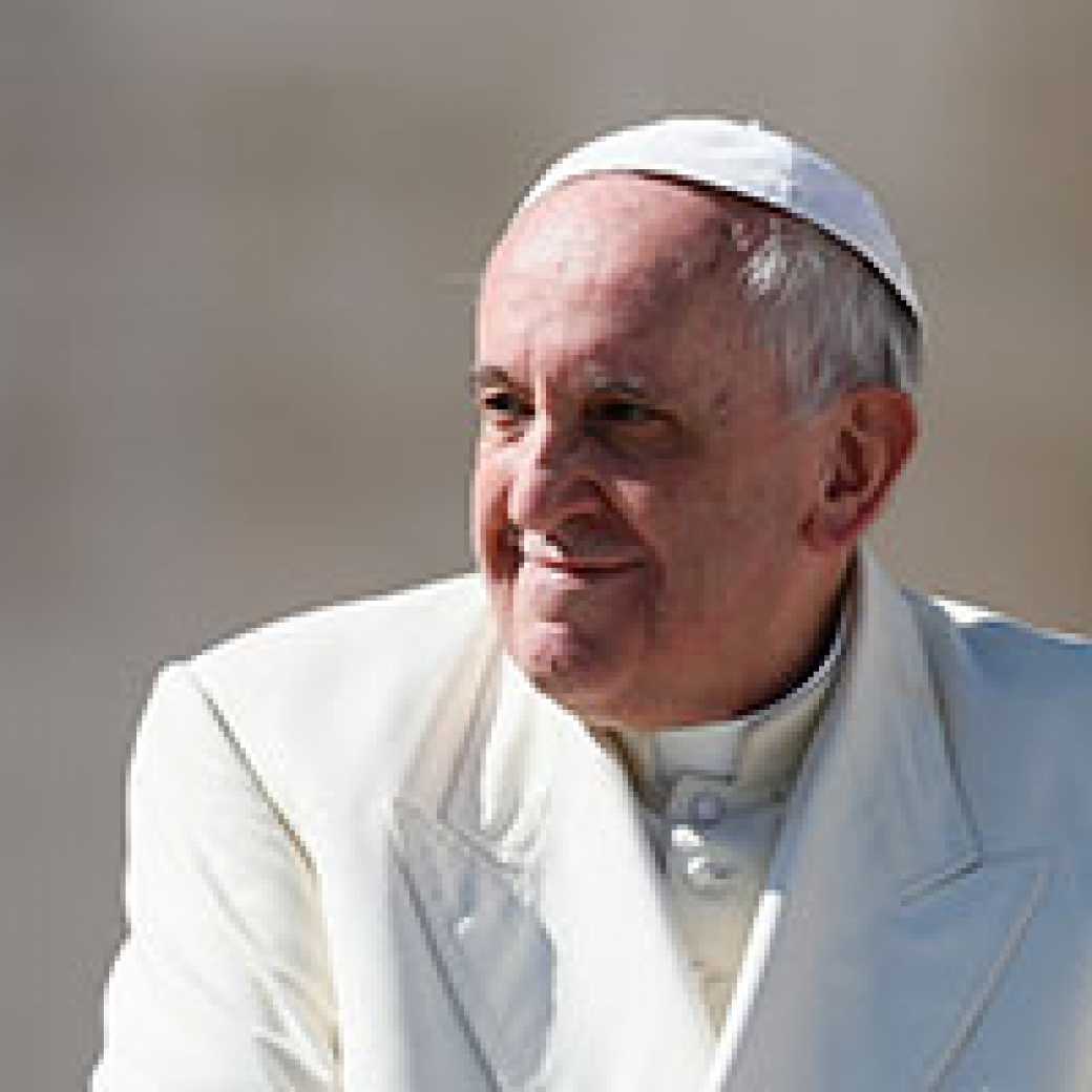 Pope Francis smiles as he leaves his general audience in St. Peter's Square at the Vatican March 5, 2014. CNS photo/Paul Haring