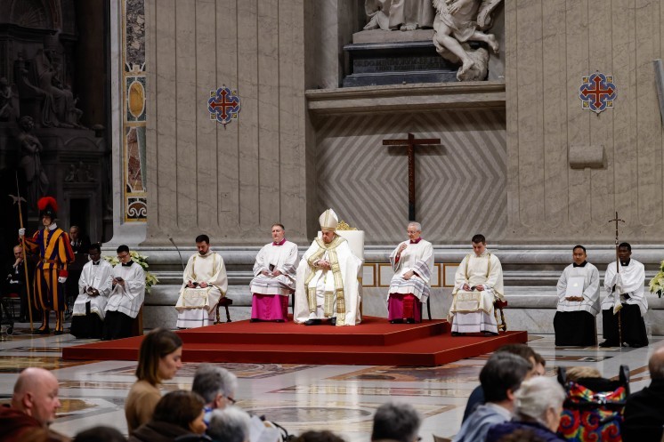 Pope Francis leads an evening prayer service on New Year's Eve.