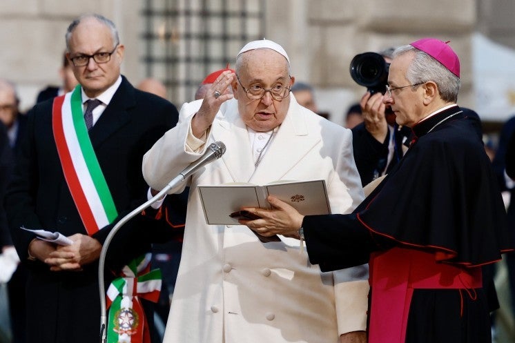 Pope Francis gives his blessing.
