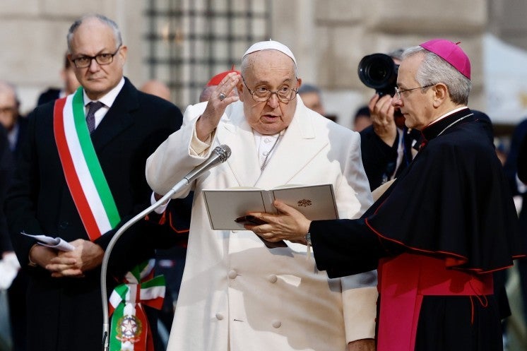 Pope Francis gives his blessing. 