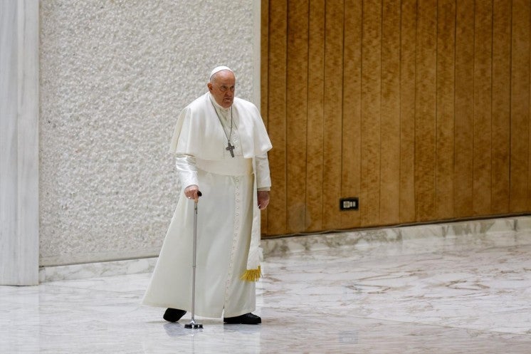 Pope Francis arrives at his general audience. 