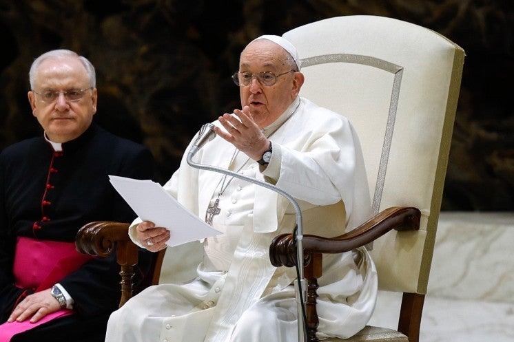 Pope Francis speaks during his general audience.