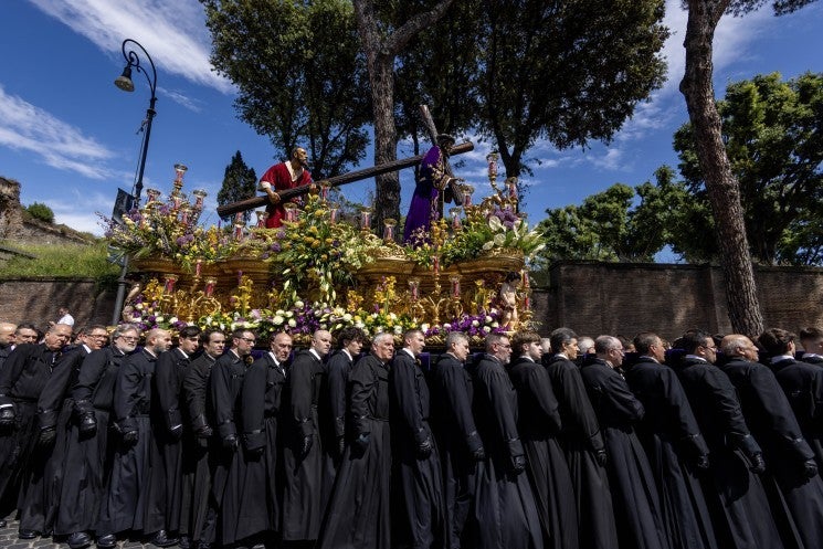 Men from León, Spain, carry a statue of Christ