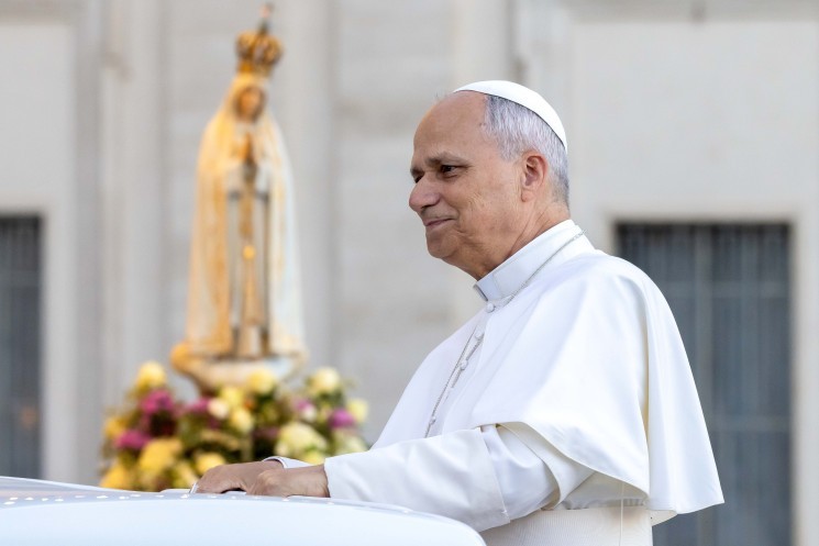 Pope Leo rides in popemobile past statue of Our Lady of Fatima