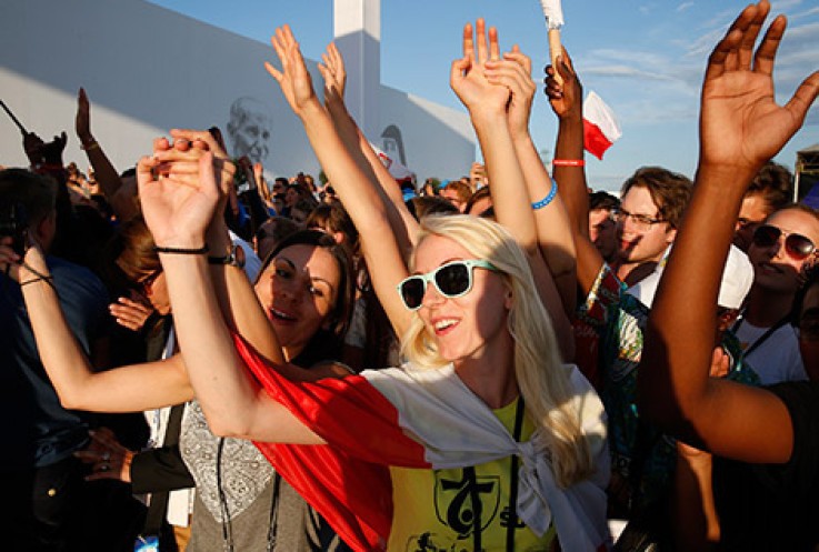 World Youth Day pilgrims cheer as Pope Francis leads the July 30 prayer vigil at the Field of Mercy in Krakow, Poland. (CNS photo/Paul Haring)